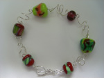 bracelet of handmade lampwork beads with sterling silver  